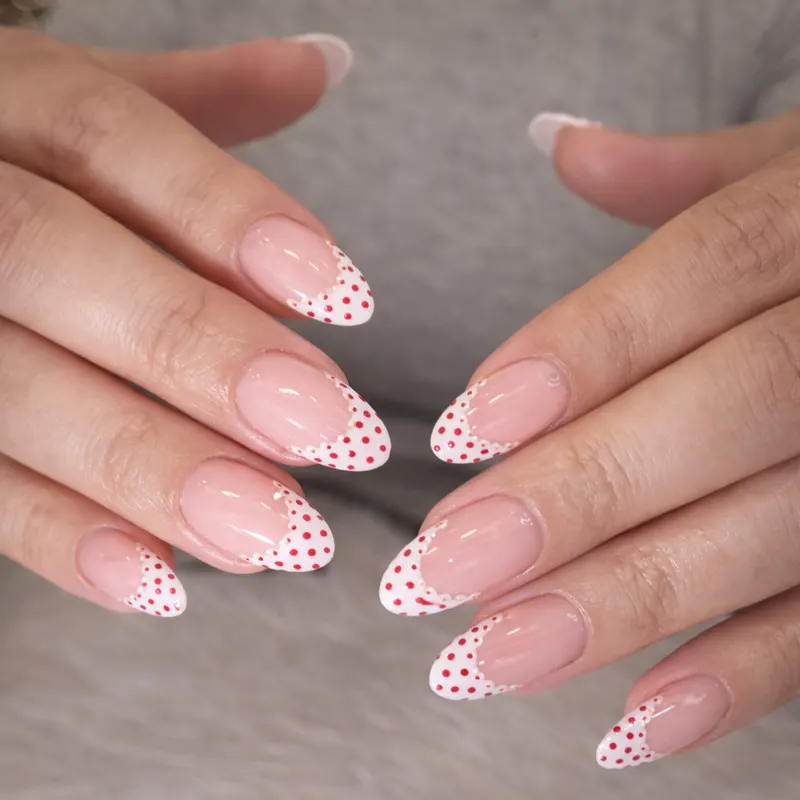 Acrylic, solar nails, nail enhancements, polka dot, French, design by Nails Unlimited in Sugar Land, TX
