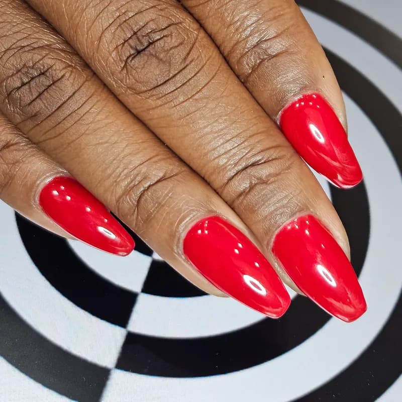Builder gel, shellac, gloss, ferrari, red by Nails Unlimited in Sugar Land, TX