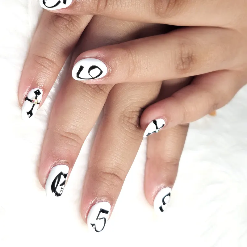 Gel, nail art, graphic design, stone by Nails Unlimited in Sugar Land, TX