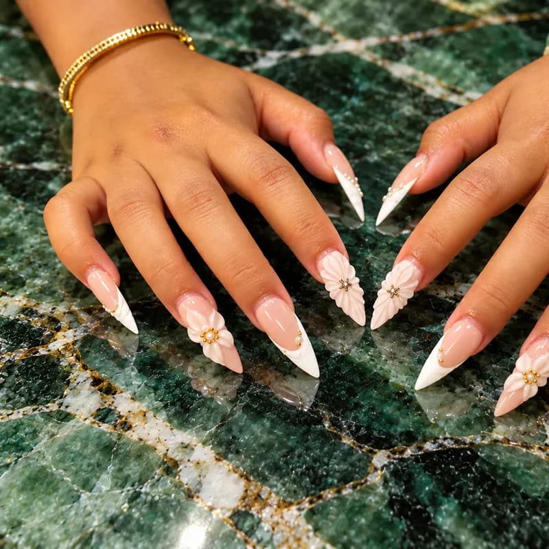 Stiletto, builder gel, French, 3D, floral, beads, pearls by Nails Unlimited in Sugar Land, TX
